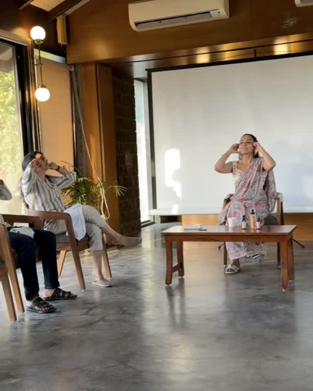 Neeru leading a face yoga workshop for a small group